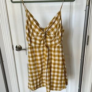 Super cute yellow and white checkered sundress with center cutout